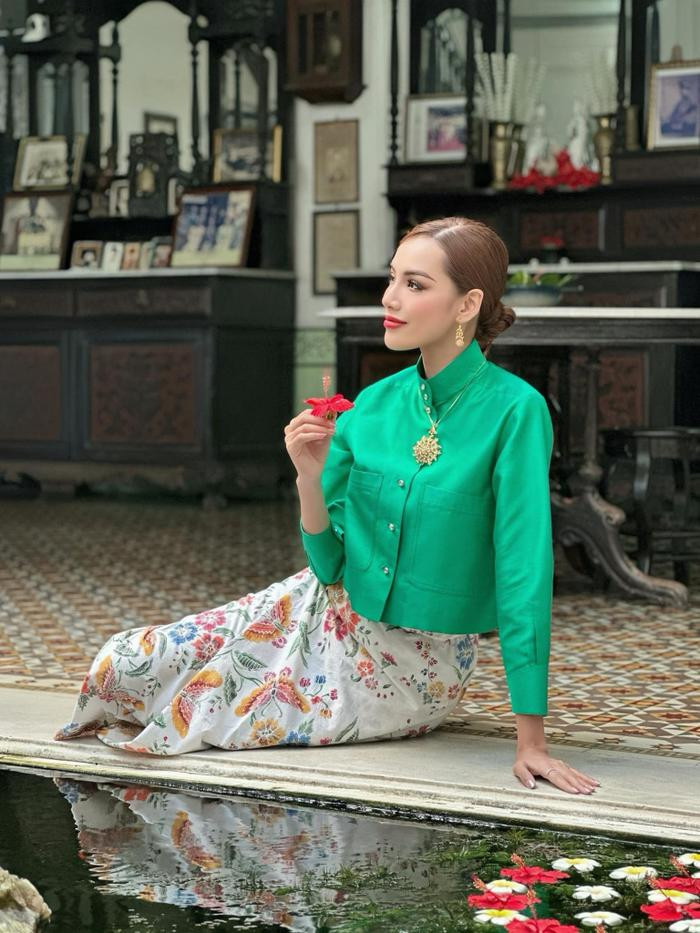 Lê Hoàng Phương mặc trang phục truyền thống hóa gái Thái dịu dàng: Nhiệm kỳ tất bật không kém Tân Hoa hậu Ảnh 1